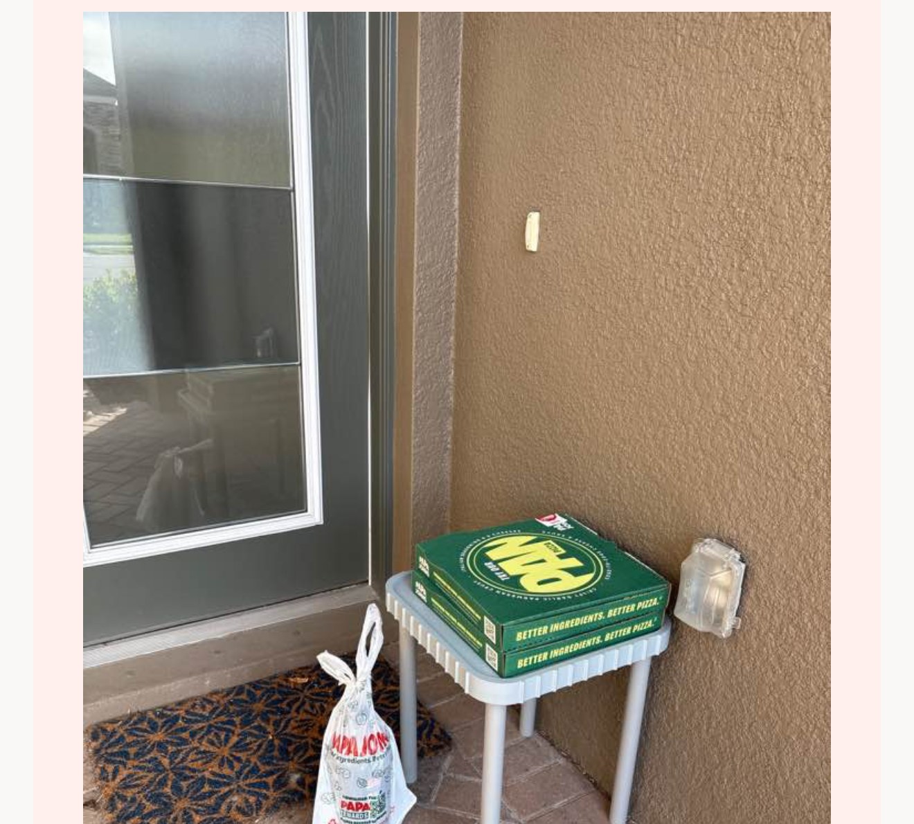 Real DoorDash no-contact delivery confirmation showing the order placed on a PorchDrop table